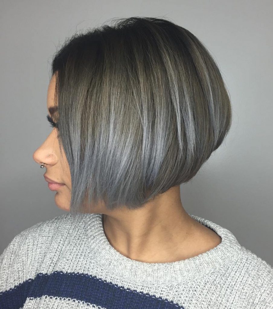 Lady in pastel blue balayage bob cut