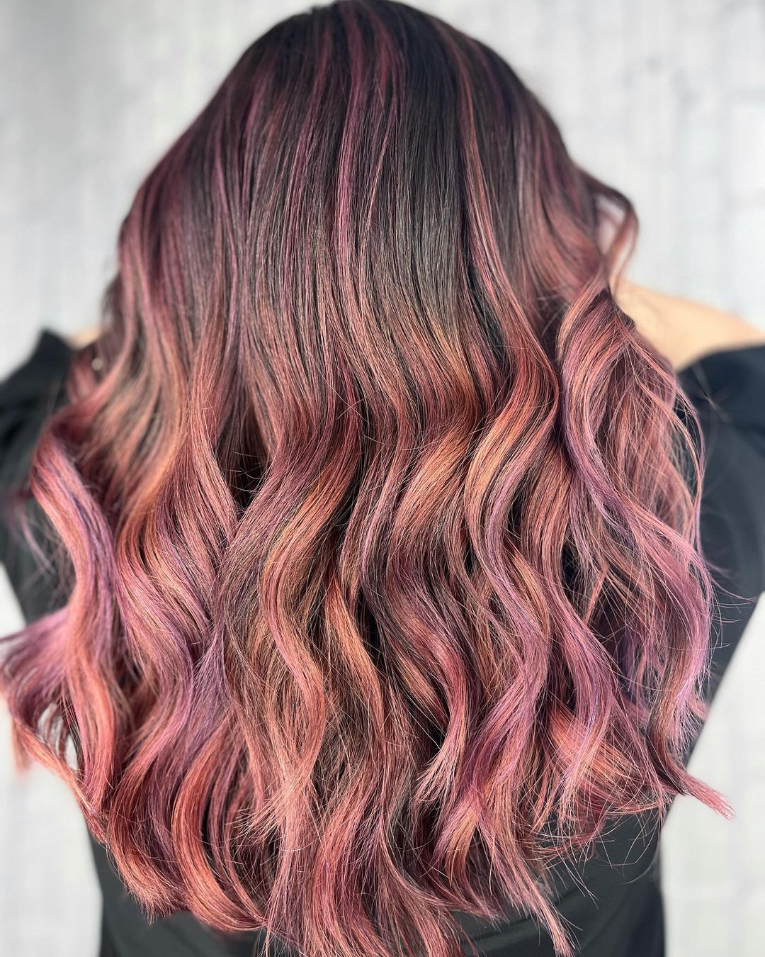 Curly Hairstyle in Rose Gold Tones for Thick Hair