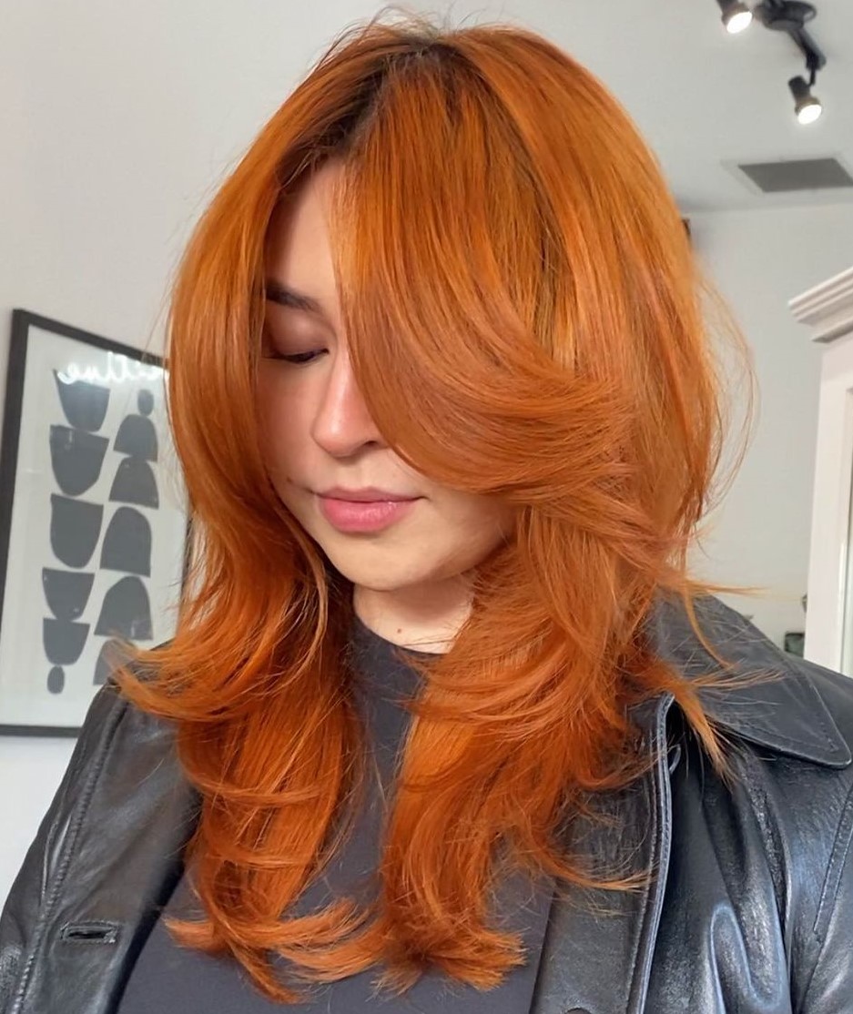 Ginger Layered Hair with Curtain Bangs