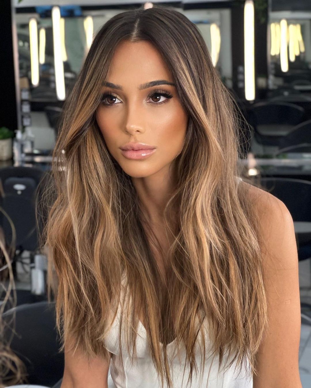 Long Haircut with Choppy Layers and Highlights