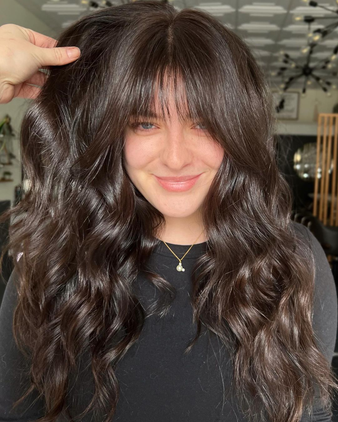 Long Wavy Hairstyle with Soft Wispy Bangs