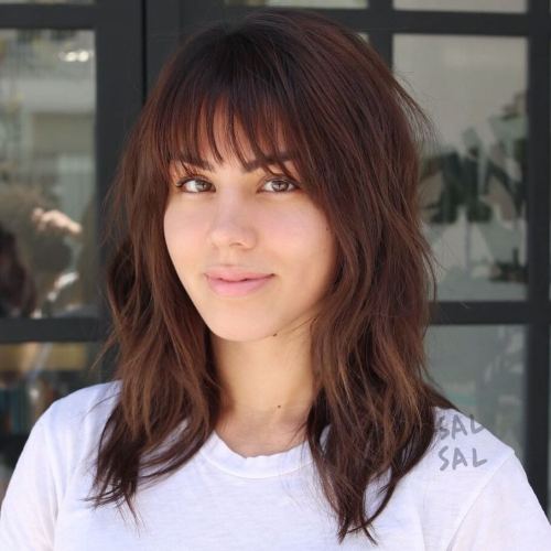 Mid-Length Layered Cut With Wispy Bangs