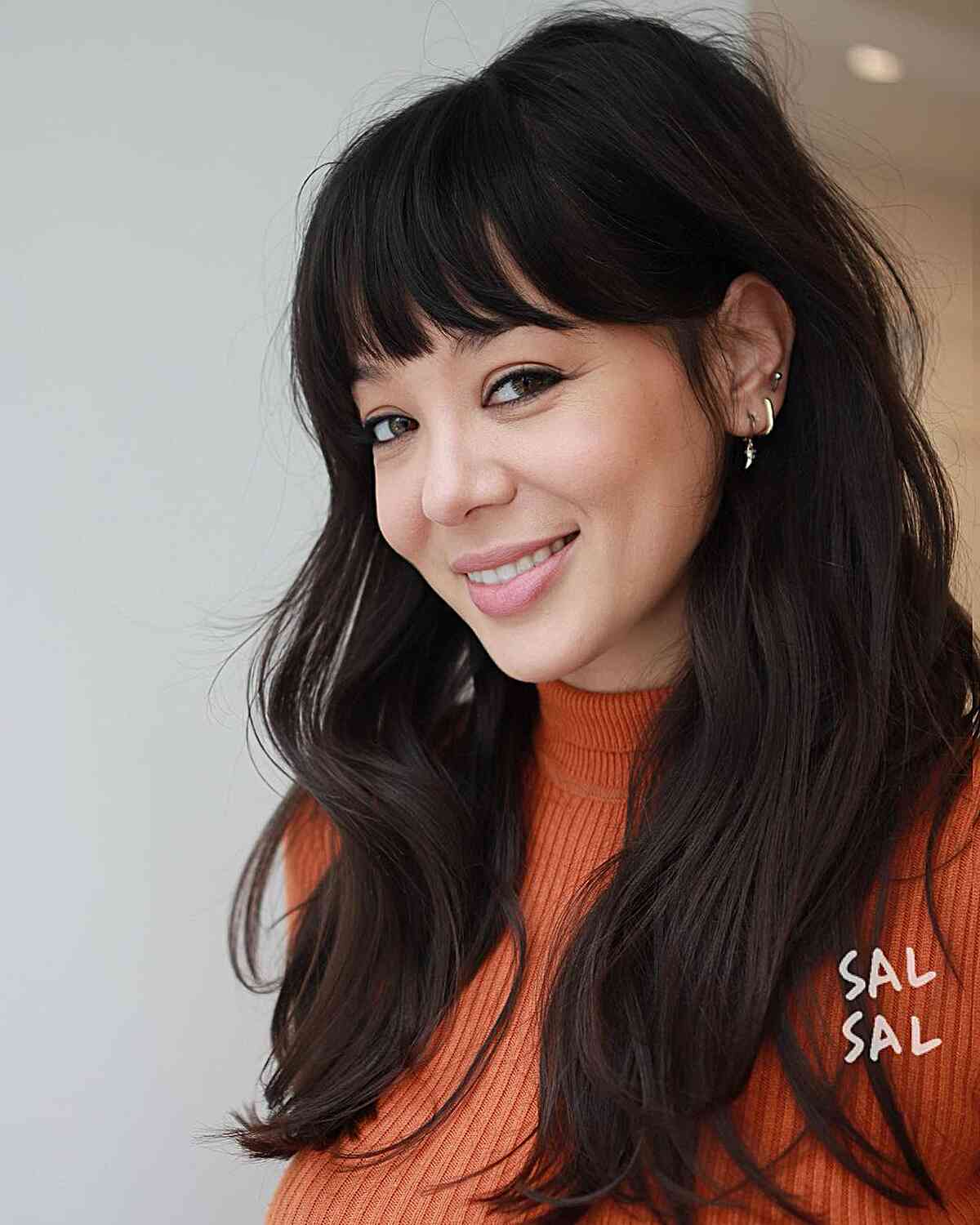 Long Dark Brunette Hair with Choppy Fringe for women who want to glow