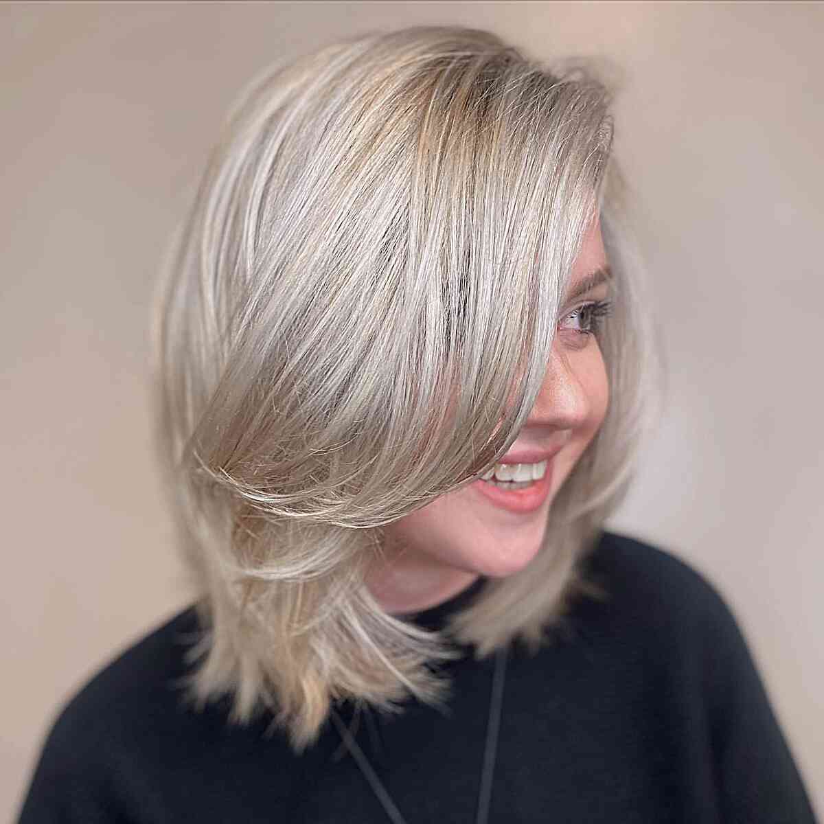 Long Soft Layers on Shoulder-Length Hair for Oval Faces