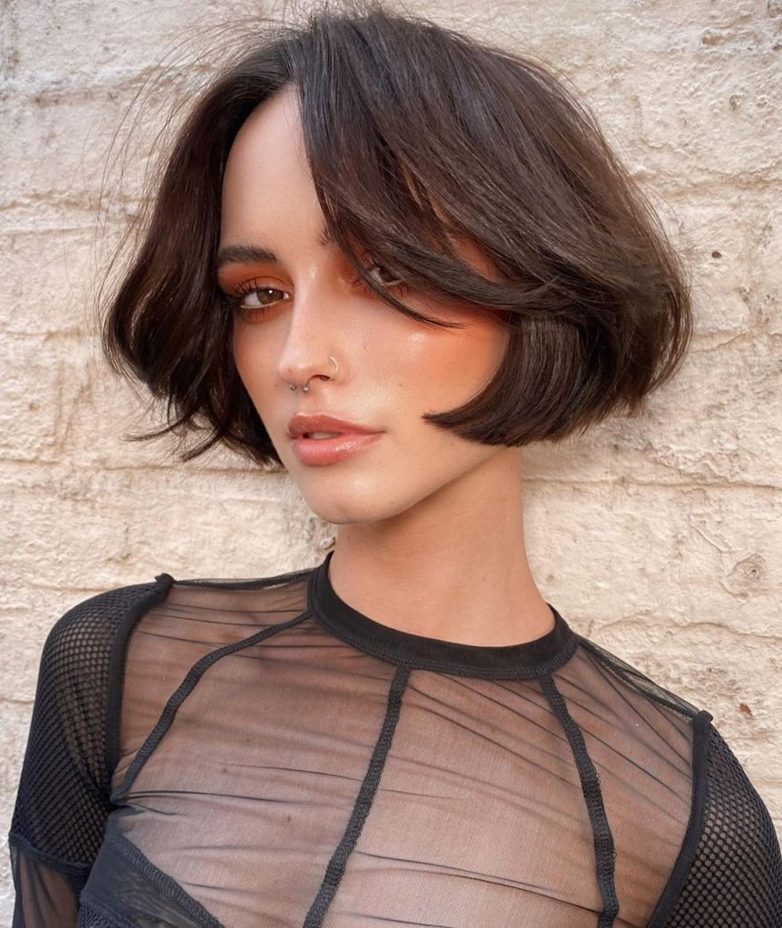 girl with tucked bob hairstyle